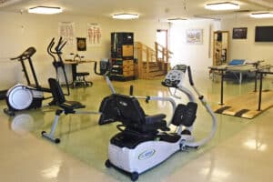 Rehab gym with bikes and parallel bars